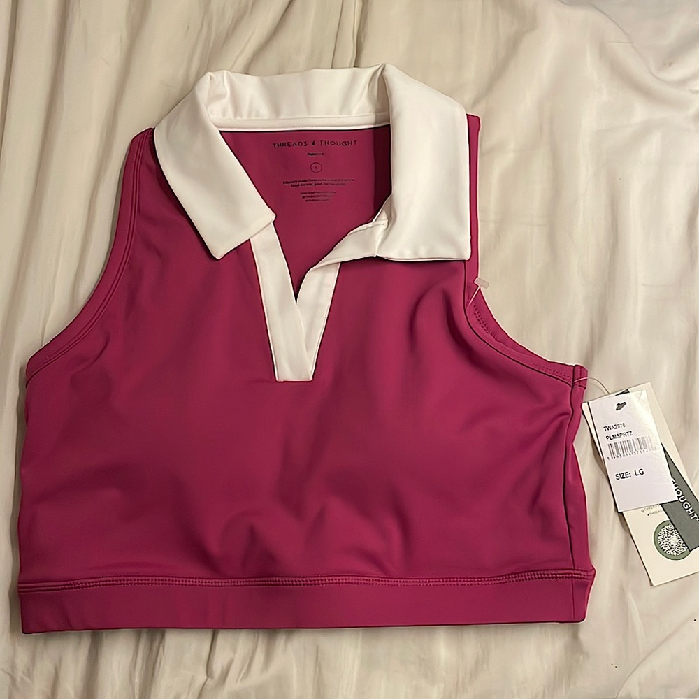 This is a cropped collared shirt with a built in bra, color magenta.